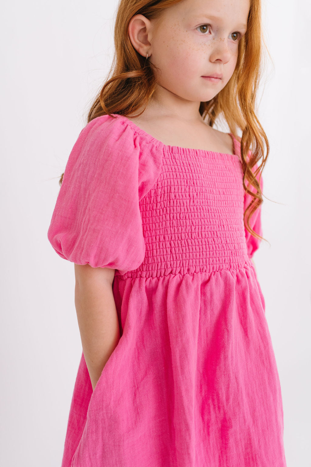 Short Puff Sleeve Smocked Twirly Dress in Azalea Pink