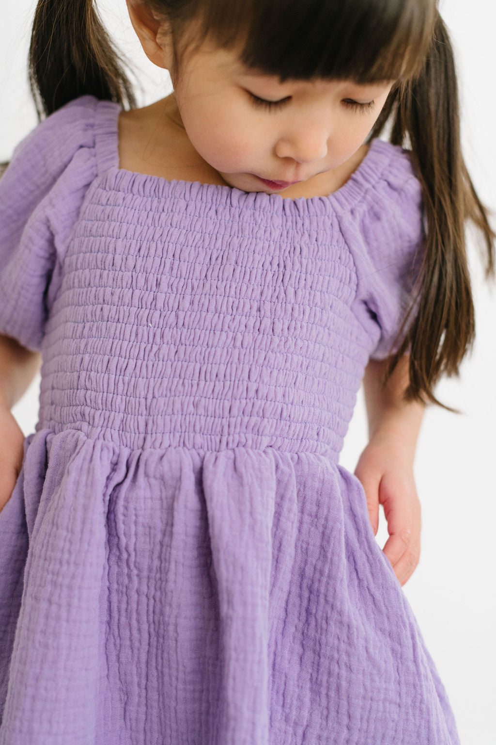 Short Puff Sleeve Smocked Twirly Dress in Lavender